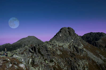 full moon in the mountainsの写真素材