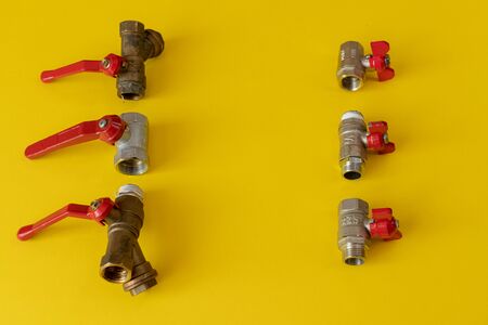 several safety valves on a colored background. safety valves with red edges. safety valves isolated. studio shootの写真素材
