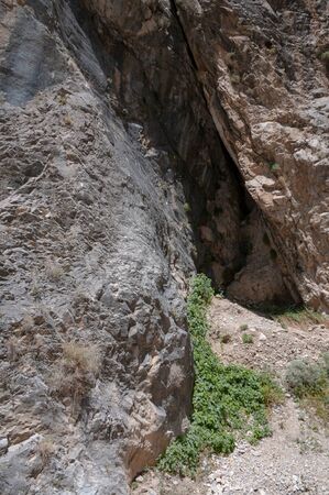 majestic high mountain. rapid canyon view. rare vegetation travel through mountainous terrain. clear blue sky. a great place for climbing and relaxing without peopleの写真素材