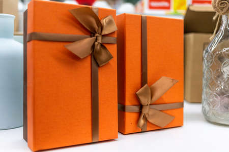 Boxes of gifts on white tableの写真素材