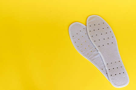 white insole that protects the feet from smell, with venting holes. High quality photoの写真素材