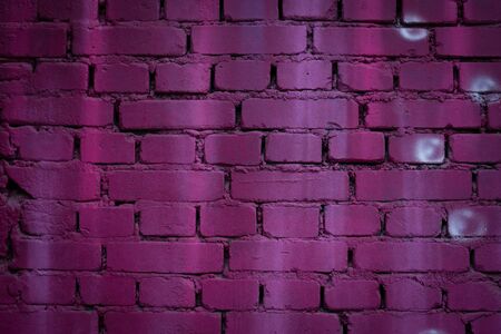 Fuchsia brick wall with bubbles texture background. Abstract street art close upの写真素材