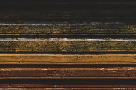 Ombre effect wooden texture background. Brown ombre. Weathered wall in sunlight close upの写真素材