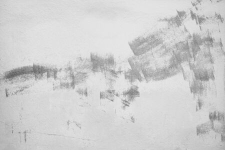 Abstract texture of white wall with gray brush strokes pattern. Beautiful, artistic, creative background. Copy spaceの写真素材