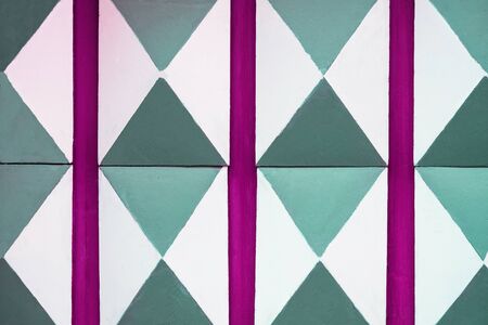 Abstract white, green and purple pattern wooden texture background. Old door decoration close upの写真素材