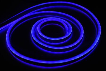 Blue LED light diode stripe cable roll on black background. Modern lightningの写真素材
