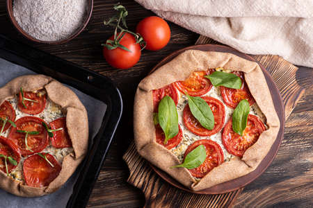 Cooked shimeji and noodles, pasta with fried mushrooms on plate on gray background.の写真素材