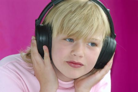 serious listening to musicの写真素材