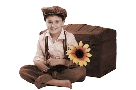 A child smiling for the camera, a vintage portrait.の写真素材