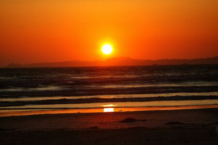 Beautiful sunset at the Ocean, Long beach, British Columbiaの写真素材