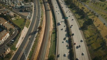 Aerial Flying over Freeway in California. Highway aerial View.の写真素材