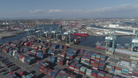 Aerial view panoramic oil tanker moving pass sea port warehouse and container ship or crane ship...