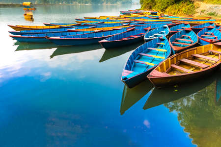 Beautiful view of Mufti color boats in Begnas Pokhara lake,Nepalのeditorial素材