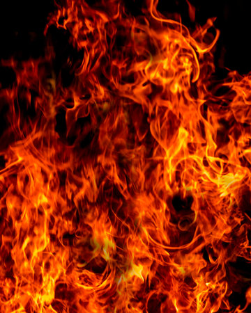 Fire flames on black background Kerala India.