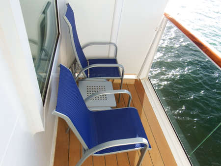 Ship balcony chairs and tableの写真素材
