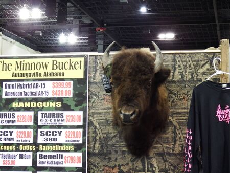 Montgomery, Alabama - August 17, 2019: The Minnow Bucket Vendor Buffalo Animal Head Display at Buckmasters Archery Competitionのeditorial素材