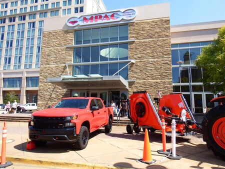 Montgomery, Alabama - August 17, 2019: Chevrolet Test Drive Truck and Kubota Vendor Sales Vehicle Displays Outside Buckmasters Archery Competition at Montgomery Performing Arts Centerのeditorial素材