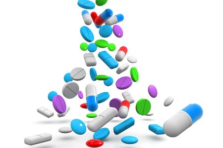Falling colorful pills.3d renderの写真素材