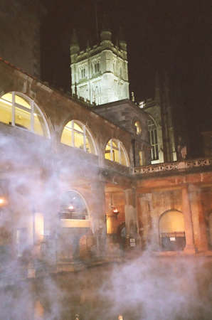 Ancient Roman baths with a view of Bath Abbey at Bath, Englandの写真素材