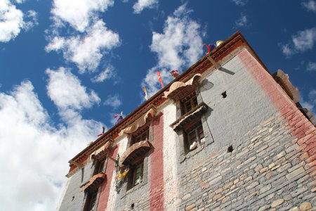 Red and grey wall with the windows in Sakya Monastery, Tibet, Chinaの写真素材