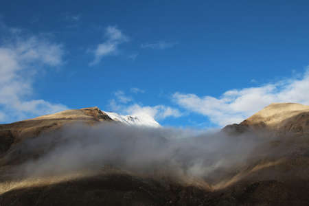 View of mountains with the clouds near the Everest Base Camp, Tibetの写真素材