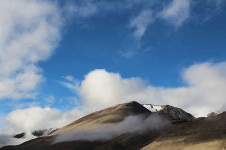 View of mountains with the clouds near the Everest Base Camp, Tibetの写真素材