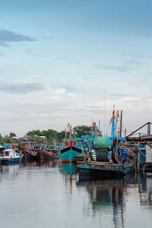 Fishing boats along the river at Bagan Sekinchan Kuala Selangor Malaysiaの写真素材