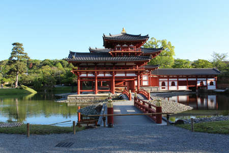 The Phoenix Hall of Byodo-in Temple during sunset in Kyoto, Japanのeditorial素材