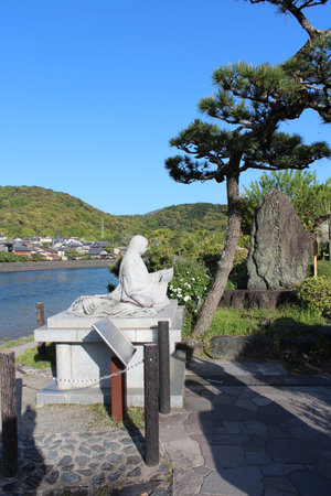 Tale of Genji Statue with the blue sky in Uji, Japan