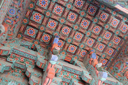 Korean traditional architecture detail of ceiling with floral pattern as decoration at Bulguksa...