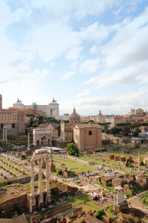 Aerial panoramic cityscape view of the Roman Forum during sunset in Rome, Italy