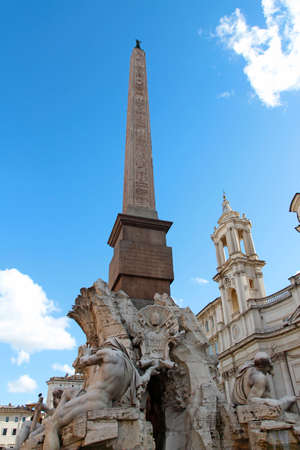 Sunny view of Piazza Navona with the Fountain of the Four Rivers (Italian: Fontana dei Quattro Fiumi) with Egyptian obeliskの写真素材