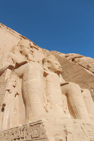 Statues of seated Ramses II at entrance of the Great Temple of Abu Simbel, Egypt