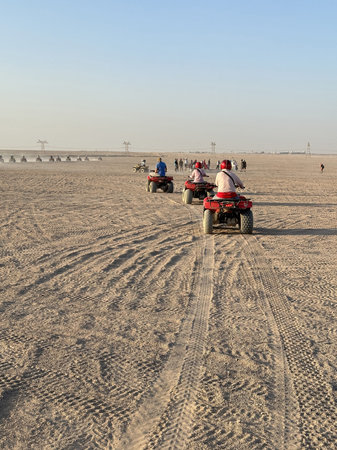 Quad bike adventure through the desert in a sunny afternoon at Hurghada, Egypt