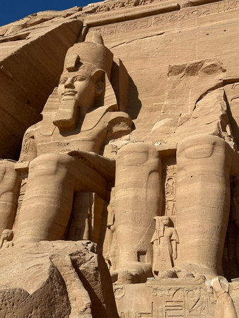 Statues of seated Ramses II at entrance of the Great Temple of Abu Simbel, Egypt