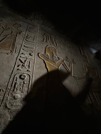 Bas-relief inscriptions on the wall at the small temple of Hathor and Nefertari, Egypt