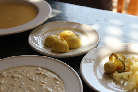 Appetizer, Tahini soup, lemon and dipping sauce in a Luxor restaurant, Egyptの写真素材