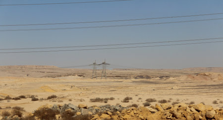 Desert scenery with the transmission tower on the road trip from Hurghada to Cairo, Egyptの写真素材