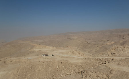 Desert scenery with a house on the road trip from Hurghada to Cairo, Egypt