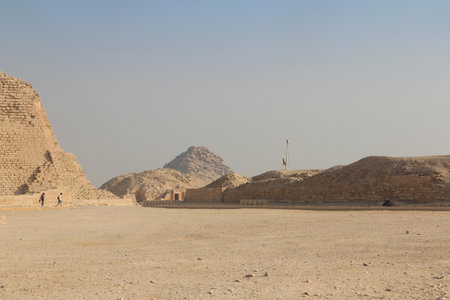 Step Pyramid of Djoser with tourists hanging around at Saqqara, Egyptの写真素材
