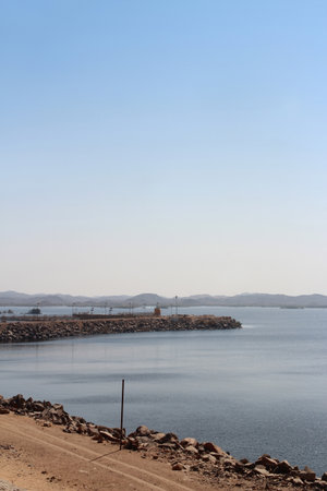 Panorama blue view of Aswan High Dam in sunny day, Egyptの写真素材