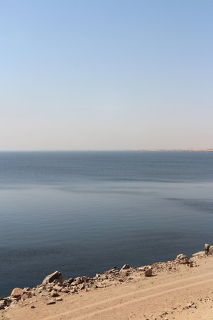 Panorama blue view of Aswan High Dam in sunny day, Egyptの写真素材