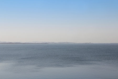 Panorama blue view of Aswan High Dam in sunny day, Egyptの写真素材