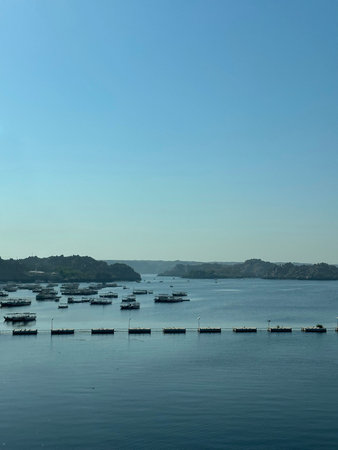 Scenery view of Aswan High Dam in sunny day, Egyptの写真素材