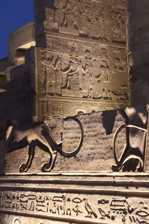 Egyptian figures and hieroglyphs on a wall at the Kom Ombo Temple, Egypt