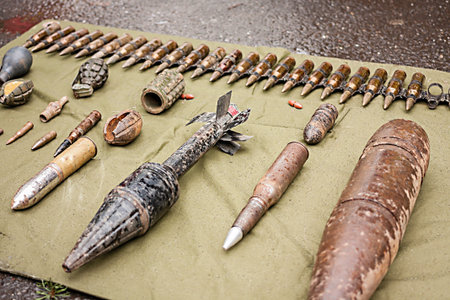 different types of ammunition displayed on floorの写真素材