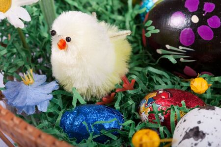 Easter eggs in basket for decorationの写真素材