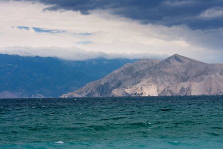 mountains in Croatia Baska with seaの写真素材