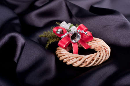 Christmas decoration on black silk backgroundの写真素材