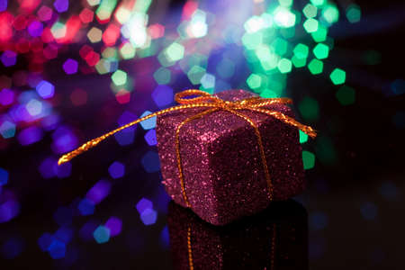 giftbox with colorful shiny backgroundの写真素材